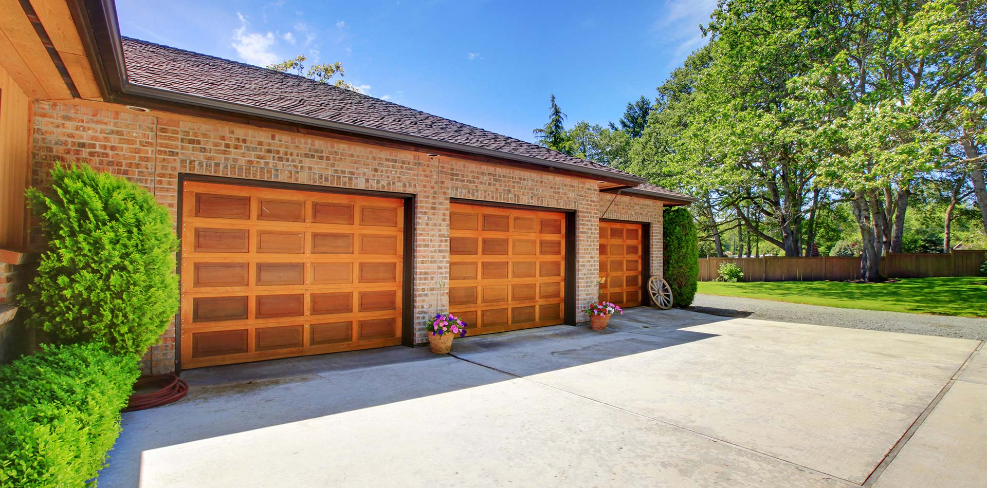 Farm house with large three car garage with nice doors